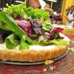 Thyme_and_Goat_Cheese_Tart_With_Mixed_Tender_Greens_in_Champagne_Vinaigrette